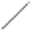 Pulsera de plata envejecida con rosetas pequeñas y piedras Swarovski, de Antara.