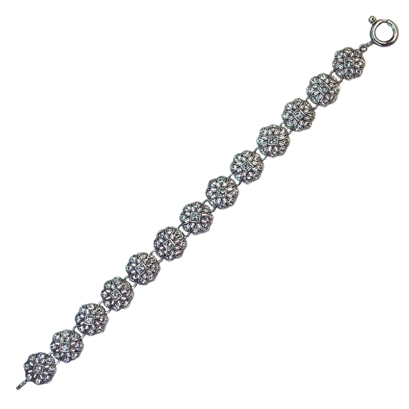 Pulsera de plata envejecida con rosetas pequeñas y piedras Swarovski, de Antara.