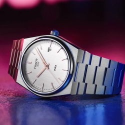 Reloj Tissot PRX de hombre en acero con detalles rosé, T1374101103100.