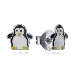 Pendientes de pingüinos como regalo. Presentado en una caja especial