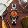 Reloj Seiko 5 Sports GMT automático en acero y esfera naranja, SSK005K1.