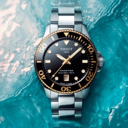 Reloj Tissot Seastar 1000 de 36 mm con esfera negra y detalles dorados, T1202102105100.