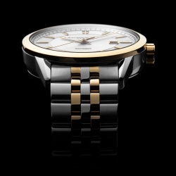 Reloj Raymond Weil Freelancer automático bicolor y esfera plateada, 2731-STP-65001.