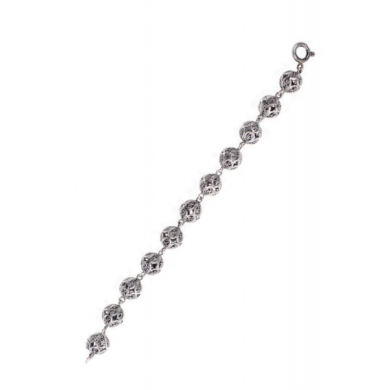 Pulsera articulada de bolas de filigrana en plata envejecida, de Antara. Pulsera articulada de bolas de filigrana en plata envejecida, de Antara.