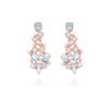 Pendientes largos de plata rosada con piedras celestes, "Alake" de Luxenter.