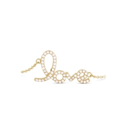 Detalle de la pulsera fina de plata dorada en oro, con palabra "Love" y cironitas, "Ashiki" de Luxenter.